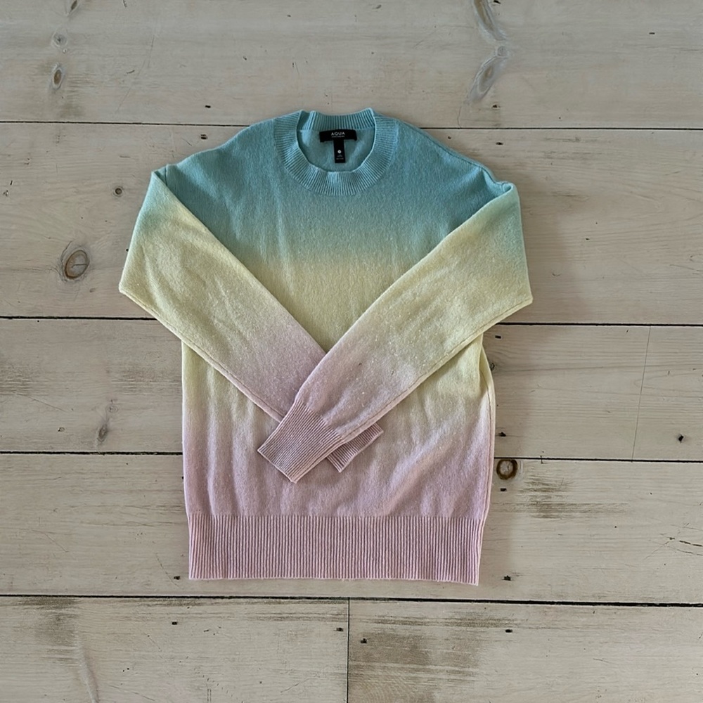 Aqua cashmere sweater. Size XS. 2 small holes on sleeve